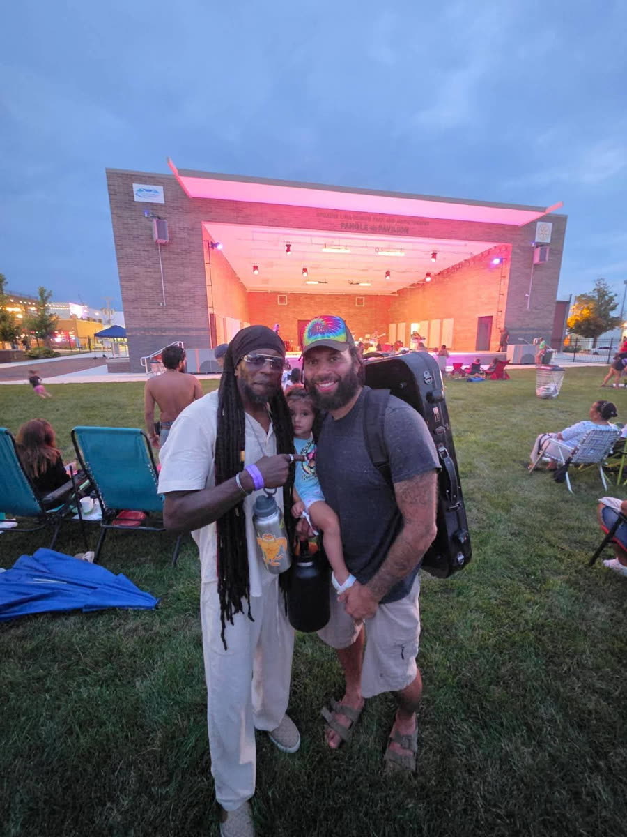 Friends gathered in front of the stage